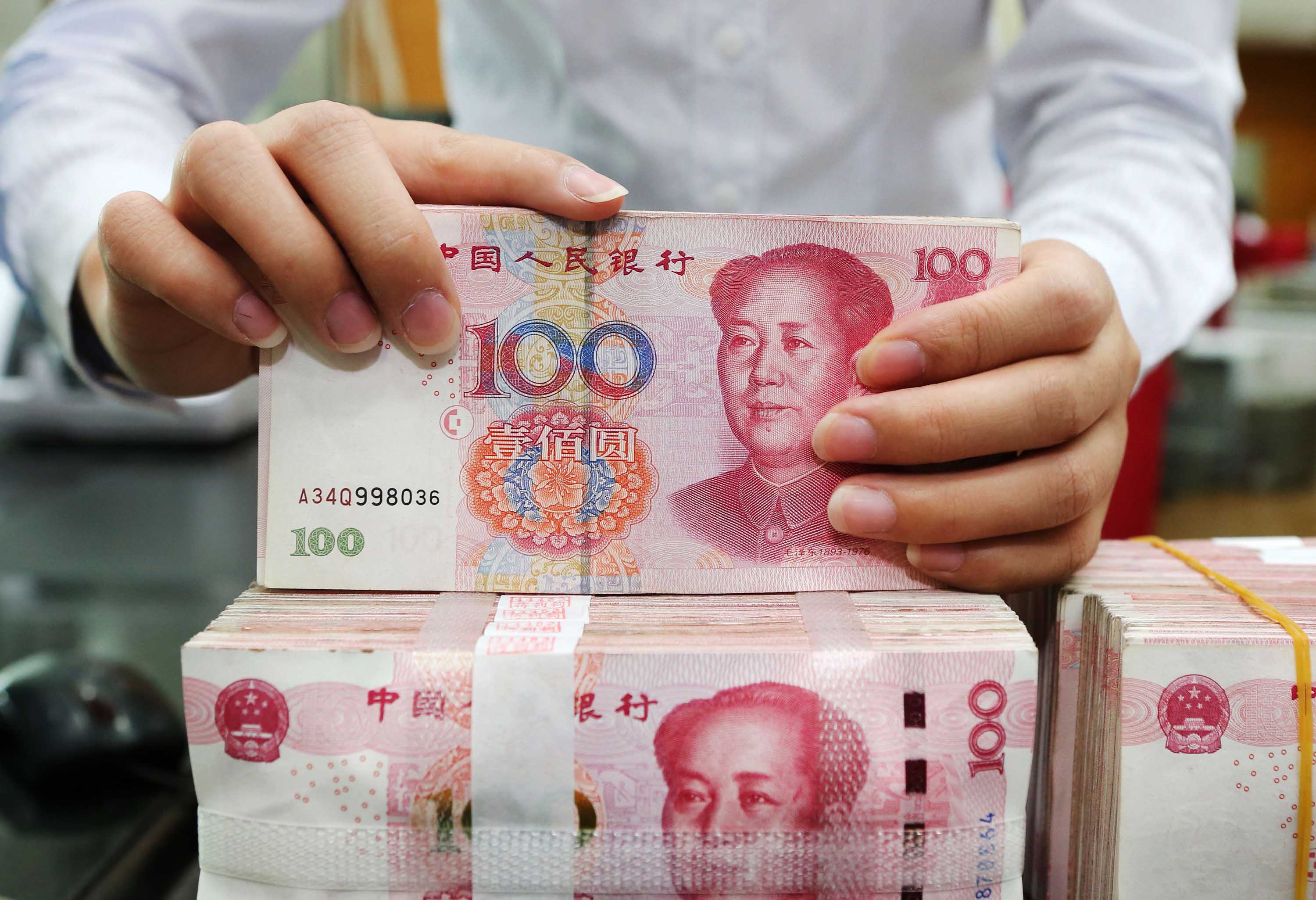 Yuan Slide Prompts Exporters To Hoard Dollars Via Swaps